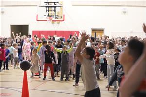 Stolley students cheering in the gym.